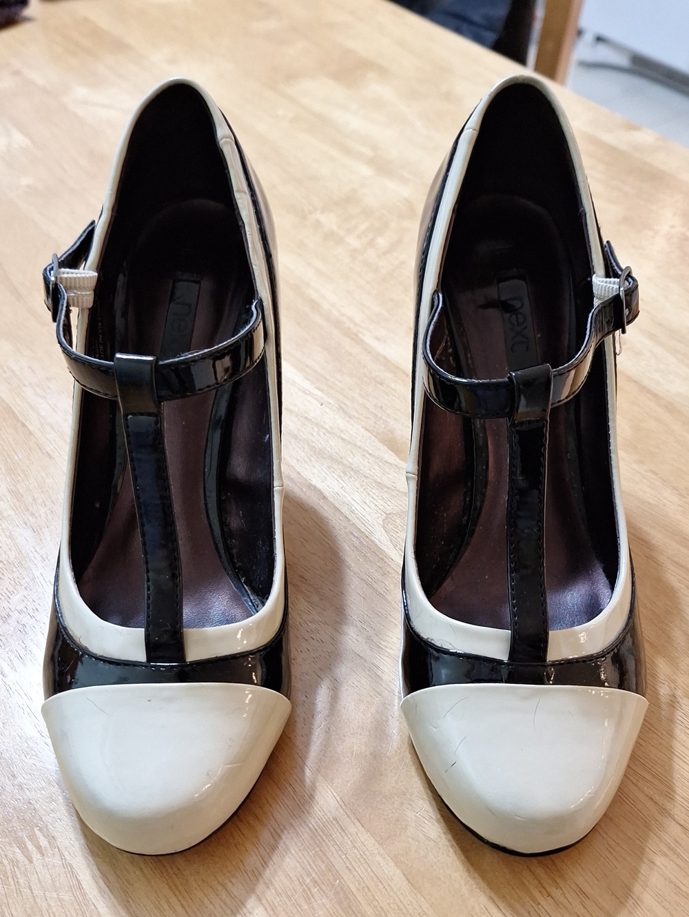 Two-Tone T-Strap Pumps in Black and Cream